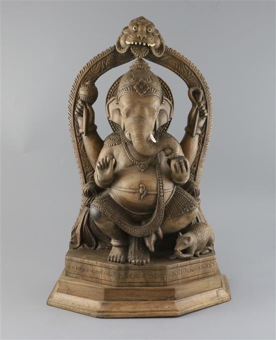 A late 19th century Indian rosewood figure of Ganesh, H.